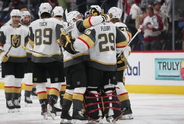 Members of the Vegas Golden Knights celebrate an overtime win against the Colorado Avalanche in Game Five of the Second Round of the 2021 Stanley Cup...