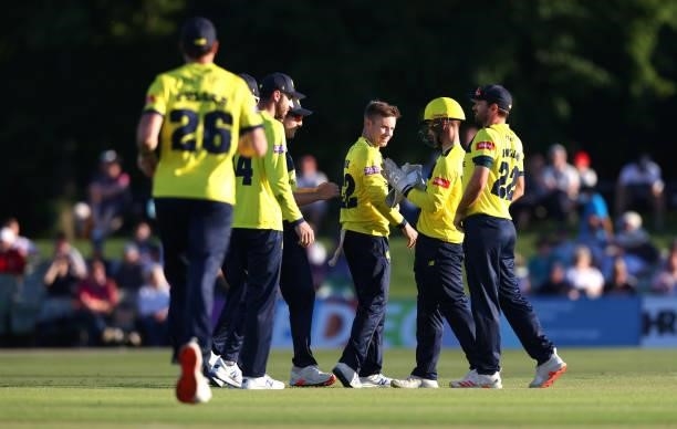 Mason Crane of Hampshire Hawks celebrates with his team mates after dismissing Jack Leaning of Kent during the Vitality T20 Blast match between Kent...