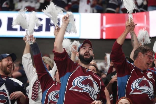Fans of the Colorado Avalanche cheeer against the Vegas Golden Knights in Game Five of the Second Round of the 2021 Stanley Cup Playoffs at Ball...