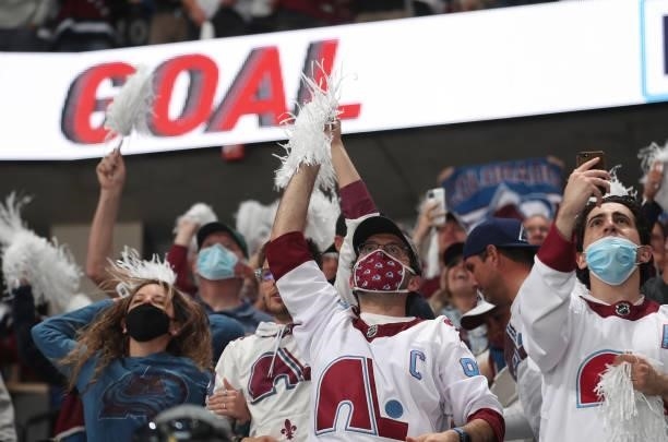 Fans of the Colorado Avalanche cheeer against the Vegas Golden Knights in Game Five of the Second Round of the 2021 Stanley Cup Playoffs at Ball...