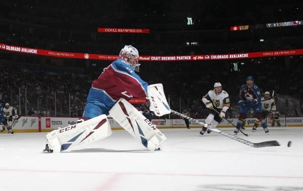 Goaltender Philipp Grubauer of the Colorado Avalanche gathers the puck against the Vegas Golden Knights in Game Five of the Second Round of the 2021...
