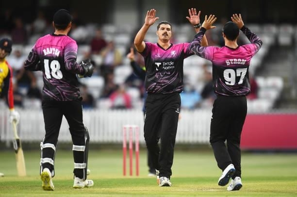 Marchant De Lange of Somerset celebrates after taking the wicket of Ryan Ten Doeschate of Essex with team mate Eddie Byrom during the Vitality T20...