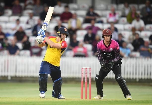 Jimmy Neesham of Essex plays a shot as Tom Banton of Somerset looks on during the Vitality T20 Blast match between Somerset and Essex at The Cooper...