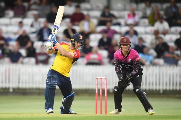 Jimmy Neesham of Essex plays a shot as Tom Banton of Somerset looks on during the Vitality T20 Blast match between Somerset and Essex at The Cooper...