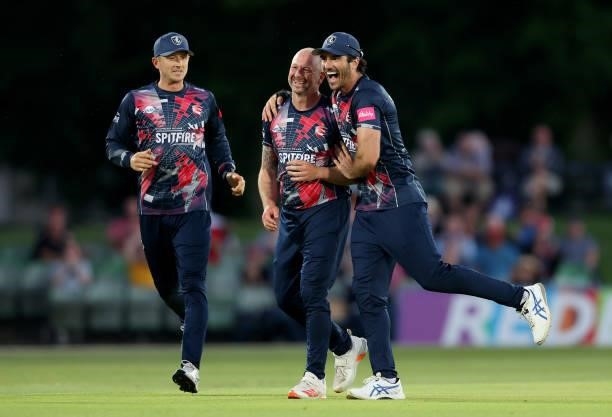 Darren Stevens of Kent celebrates with Joe Denly and Jack Leaning after dismissing James Vince of Hampshire Hawks during the Vitality T20 Blast match...