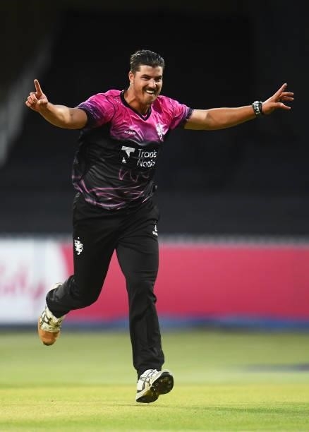 Marchant De Lange of Somerset celebrates after taking the wicket of Jimmy Neesham of Essex during the Vitality T20 Blast match between Somerset and...