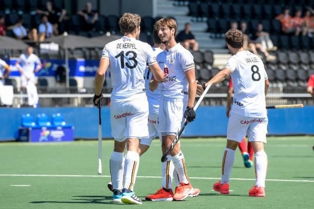 Antoine Kina celebrates with Nicolas de Kerpel of Belgium after scoring his sides fifth goal during the Euro Hockey Championships match between...