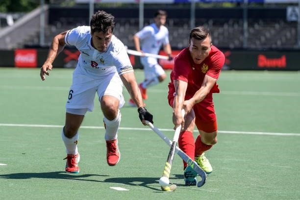 Alexander Hendrickx of Belgium and Ilfat Zamalutdinov of Russia battle for possession during the Euro Hockey Championships match between Belgium and...
