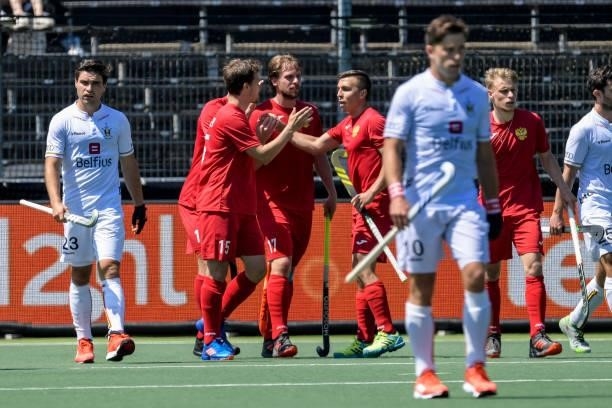 Andrey Kuraev of Russia celebrates with his teammates after scoring his side's second goal during the Euro Hockey Championships match between Belgium...