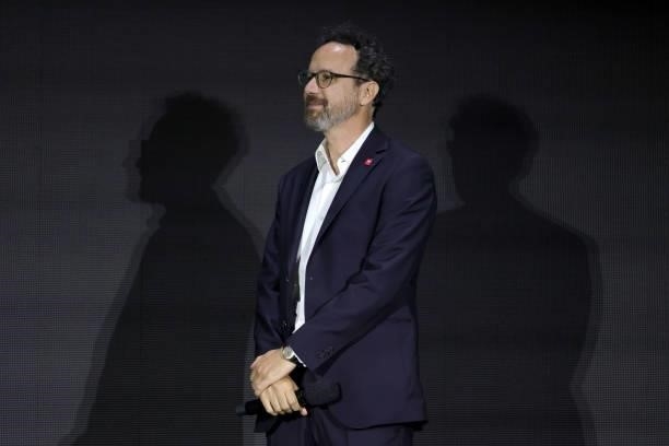 Berlinale Artistic Director Carlo Chatrian is seen on stage at the Opening Ceremony and "The Mauritanian