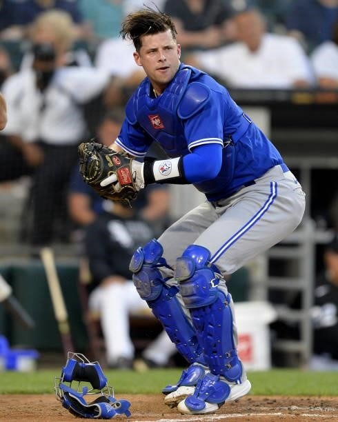 Riley Adams of the Toronto Blue Jays catches while making his Major League debut against the Chicago White Sox on June 8, 2021 at Guaranteed Rate...