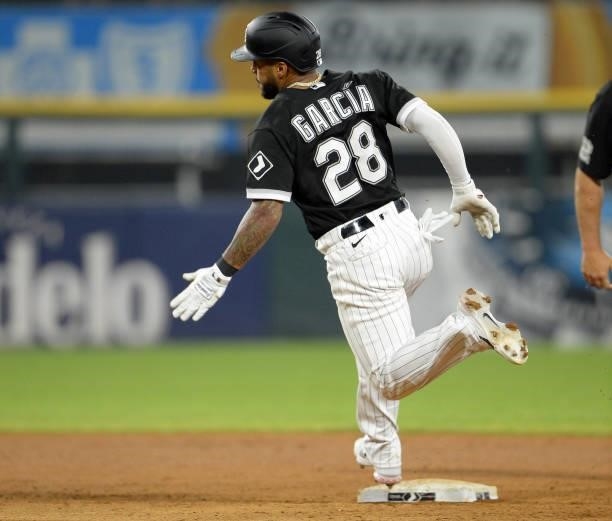 Leury Garcia of the Chicago White Sox runs the bases while hitting a triple against the Toronto Blue Jays on June 8, 2021 at Guaranteed Rate Field in...