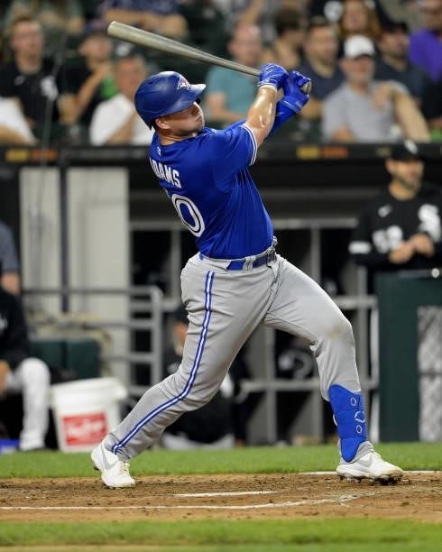 Riley Adams of the Toronto Blue Jays hits a double for his first hit while making his Major League debut against the Chicago White Sox on June 8,...