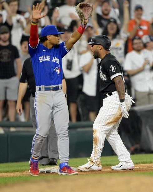 Leury Garcia of the Chicago White Sox reacts after hitting a triple against the Toronto Blue Jays on June 8, 2021 at Guaranteed Rate Field in...