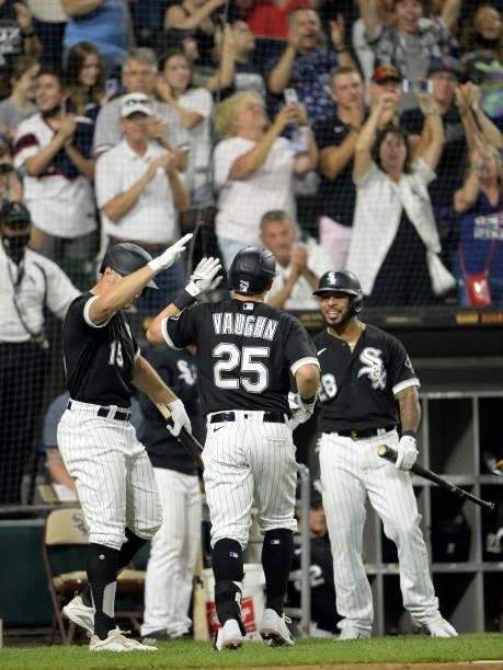 Andrew Vaughn of the Chicago White Sox celebrates with teammates after hitting a solo home run in the seventh inning against the Toronto Blue Jays on...