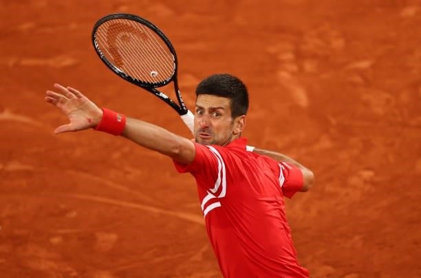 Novak Djokovic of Serbia celebrates match point and victory during his Mens Singles Quarter-Final match against Matteo Berrettini of Italy during Day...