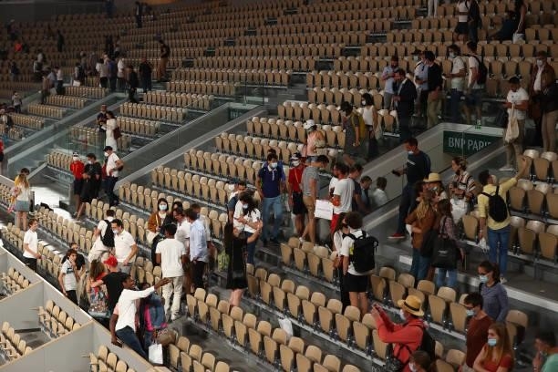 General view as play is suspended with fans being made to leave the stadium due to government curfew restrictions during the Mens Singles...