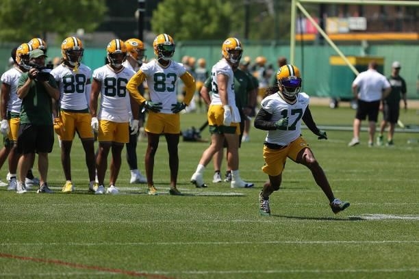 Davante Adams of the Green Bay Packers works out during training camp at Ray Nitschke Field on June 09, 2021 in Ashwaubenon, Wisconsin.