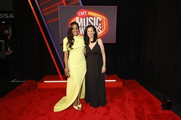 Mickey Guyton and Leslie Fram attend the 2021 CMT Music Awards at Bridgestone Arena on June 09, 2021 in Nashville, Tennessee.