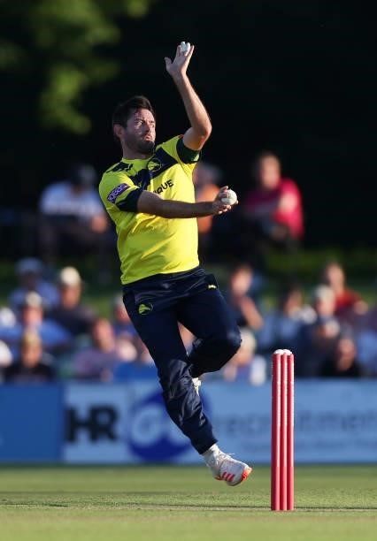 Ian Holland of Hampshire Hawks bowls during the Vitality T20 Blast match between Kent Spitfires and Hampshire Hawks at The Spitfire Ground on June...