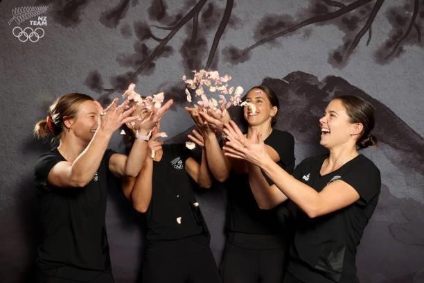 The Women's Hockey team throw up rose petals during the New Zealand Hockey team announcement at the National Hockey Centre on June 10, 2021 in...