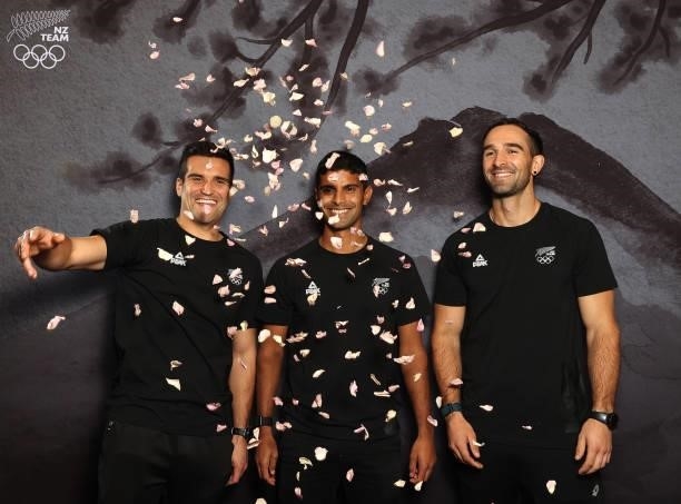 The Men's Hockey team throw up rose petals during the New Zealand Hockey team announcement at the National Hockey Centre on June 10, 2021 in...