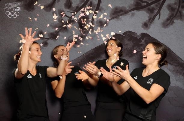 The Women's Hockey team throw up rose petals during the New Zealand Hockey team announcement at the National Hockey Centre on June 10, 2021 in...