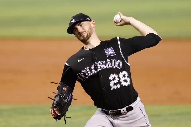 Austin Gomber of the Colorado Rockies delivers a pitch against the Miami Marlins during the first inning at loanDepot park on June 09, 2021 in Miami,...