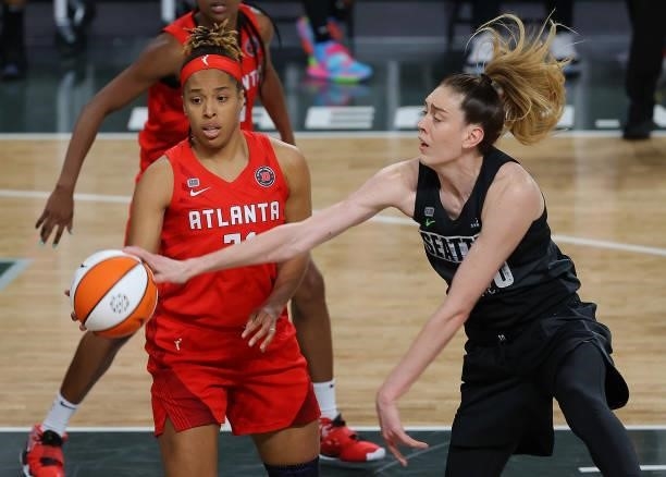 Breanna Stewart of the Seattle Storm draws a foul from Tianna Hawkins of the Atlanta Dream in the second half at Gateway Center Arena on June 09,...