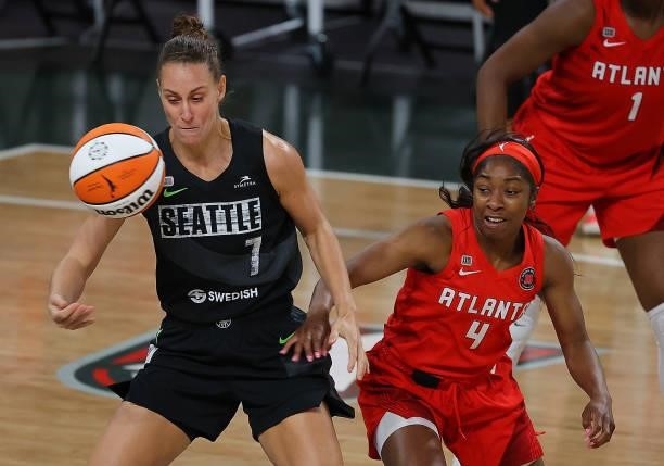 Stephanie Talbot of the Seattle Storm loses the ball as she spins against Aari McDonald of the Atlanta Dream in the second half at Gateway Center...