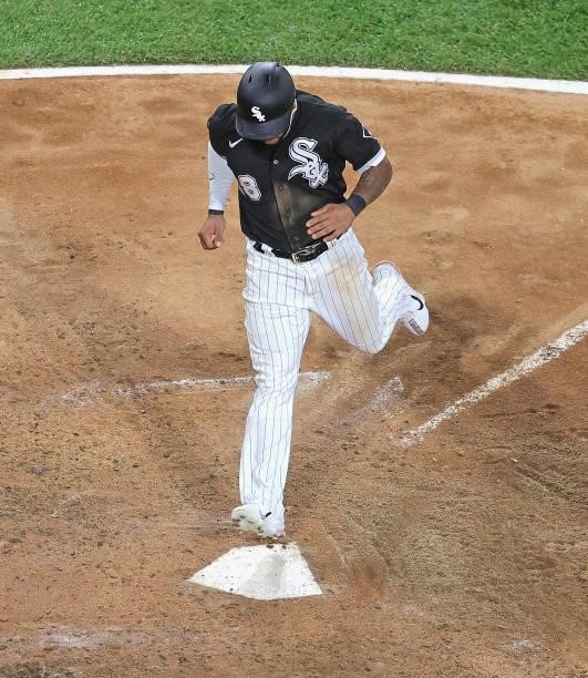 Leury Garcia of the Chicago White Sox crosses the plate to score a run in the 5th inning against the Toronto Blue Jays at Guaranteed Rate Field on...