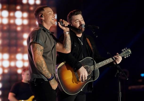 Kane Brown and Chris Young perform onstage for the 2021 CMT Music Awards at Bridgestone Arena on June 09, 2021 in Nashville, Tennessee.