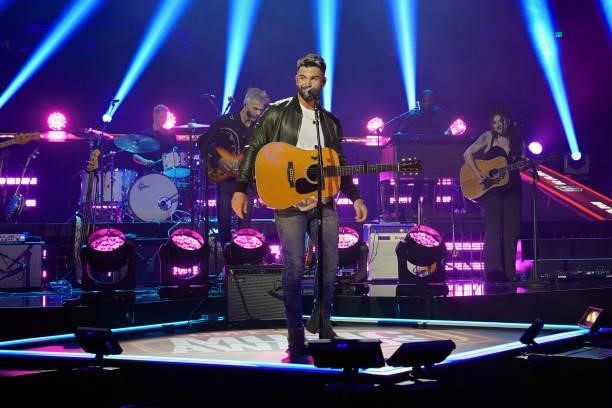 Dylan Scott performs on the Ram Trucks Stage for the 2021 CMT Music Awards at Bridgestone Arena on June 09, 2021 in Nashville, Tennessee.