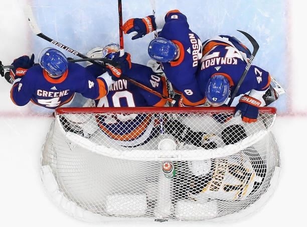 The New York Islanders trap Chris Wagner of the Boston Bruins in the net in Game Six of the Second Round of the 2021 NHL Stanley Cup Playoffs at the...