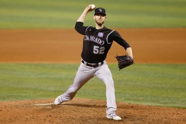 Daniel Bard of the Colorado Rockies delivers a pitch during the ninth inning against the Miami Marlins at loanDepot park on June 09, 2021 in Miami,...