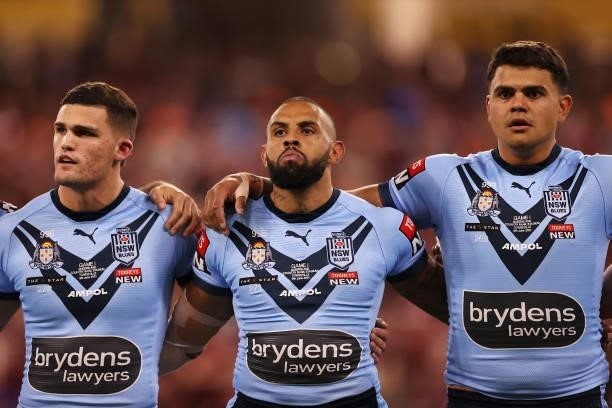 Nathan Cleary, Josh Addo-Carr and Latrell Mitchell of the Blues prepare for the anthem during game one of the 2021 State of Origin series between the...