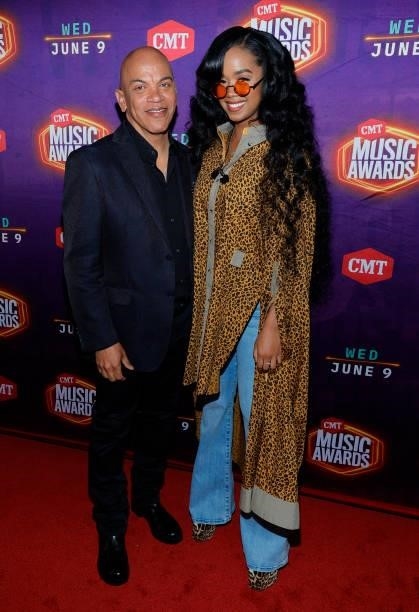 Rickey Minor and H.E.R. Attend the 2021 CMT Music Awards at Bridgestone Arena on June 09, 2021 in Nashville, Tennessee.