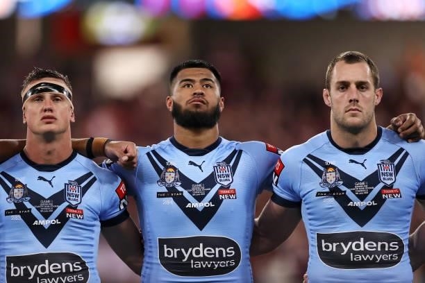 Jack Wighton, Payne Haas and Isaah Yeo sing the anthem before game one of the 2021 State of Origin series between the New South Wales Blues and the...