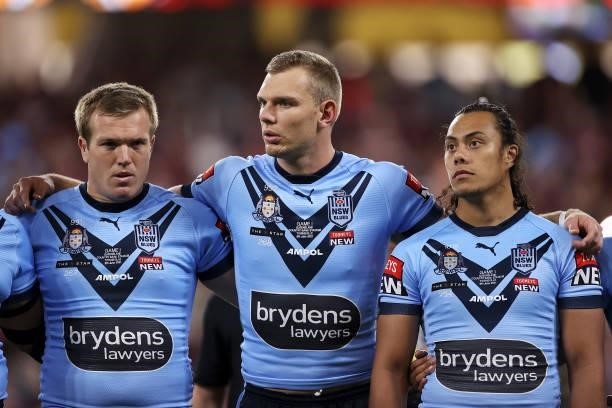 Jake Trbojevic, Tom Trbojevic and Jarome Luai prepare for the anthem before game one of the 2021 State of Origin series between the New South Wales...