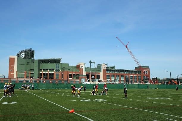 Members of the Green Bay Packers work out during training camp at Ray Nitschke Field on June 09, 2021 in Ashwaubenon, Wisconsin.