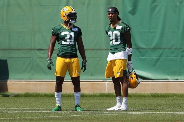 Adrian Amos and Kevin King of the Green Bay Packers work out during training camp at Ray Nitschke Field on June 09, 2021 in Ashwaubenon, Wisconsin.