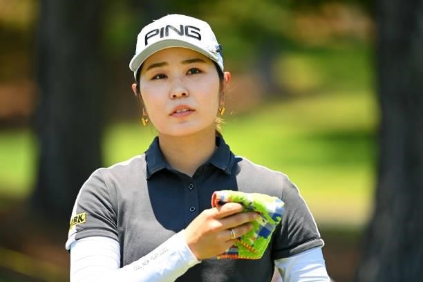 Mamiko Higa of Japan reacts after holing out on the 9th green during the first round of the Ai Miyazato Suntory Ladies Open at Rokko Kokusai Golf...
