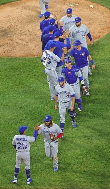Members of the Toronto Blue Jays celebrate a win over the Chicago White Sox at Guaranteed Rate Field on June 09, 2021 in Chicago, Illinois. The Blue...