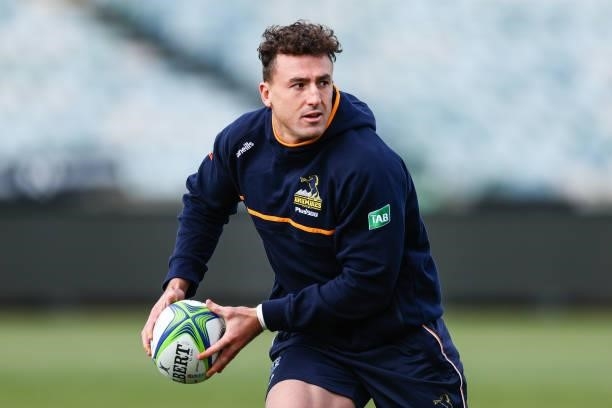 Tom Banks passes during an ACT Brumbies Super Rugby Trans-Tasman captain's run at GIO Stadium on June 10, 2021 in Canberra, Australia.