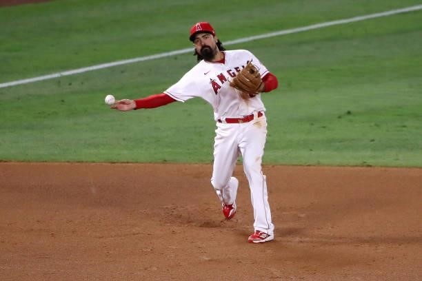 Anthony Rendon of the Los Angeles Angels makes the throw to first base for the out during the eighth inning against the Kansas City Royals at Angel...