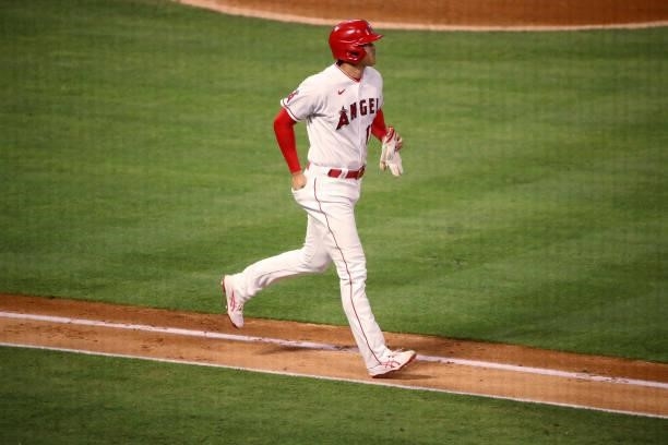 Shohei Ohtani of the Los Angeles Angels jogs to first base during the fifth inning against the Kansas City Royals at Angel Stadium of Anaheim on June...