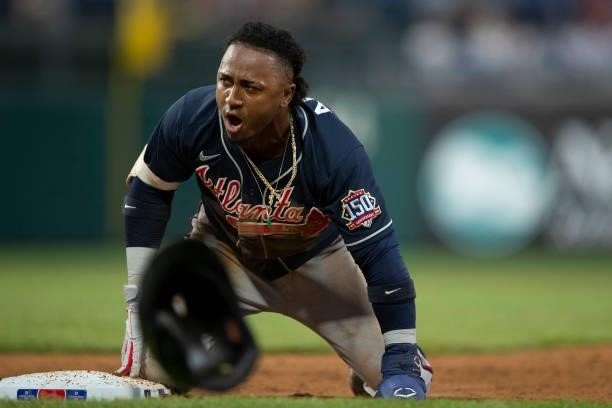 Ozzie Albies of the Atlanta Braves reacts against the Philadelphia Phillies at Citizens Bank Park on June 9, 2021 in Philadelphia, Pennsylvania. The...