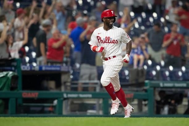 Andrew McCutchen of the Philadelphia Phillies reacts after a walk-off two run home run by Luke Williams in the bottom of the ninth inning against the...