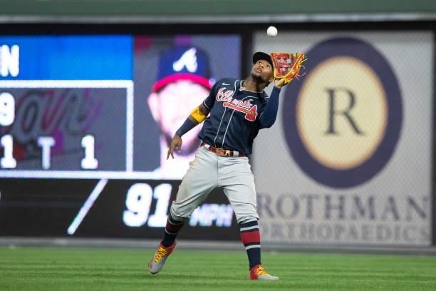 Ronald Acuna Jr. #13 of the Atlanta Braves catches the ball against the Philadelphia Phillies at Citizens Bank Park on June 9, 2021 in Philadelphia,...