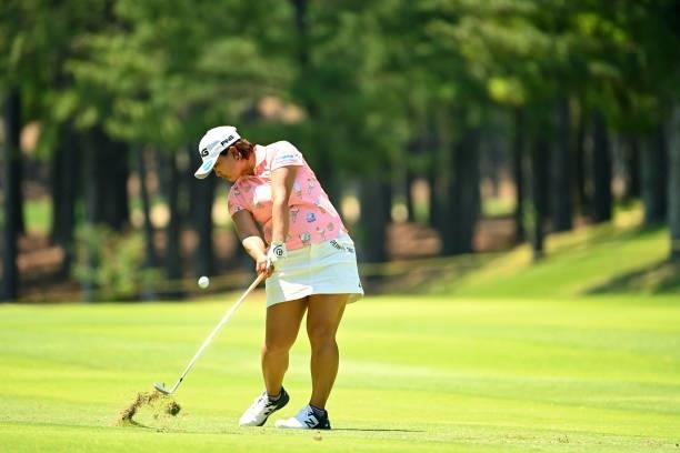 Ai Suzuki of Japan hits her third shot on the 4th hole during the first round of the Ai Miyazato Suntory Ladies Open at Rokko Kokusai Golf Club on...